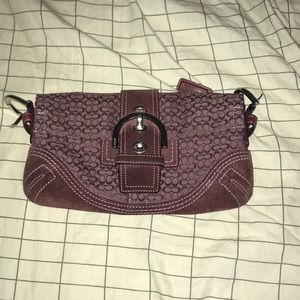 Purple print buckled coach purse